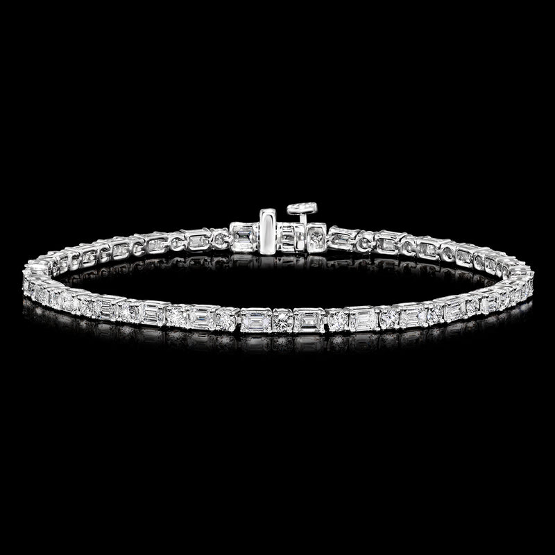 Diamond tennis bracelet in 14kt white gold, row of round and emerald-cut stones