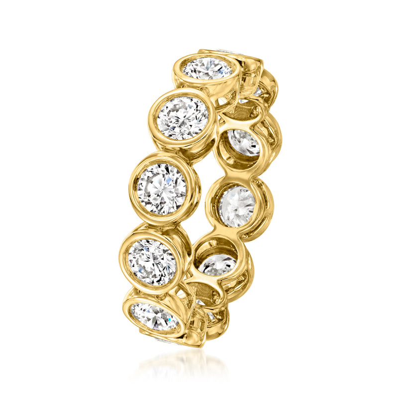 Yellow gold bezel-set diamond eternity band with round stones, side view