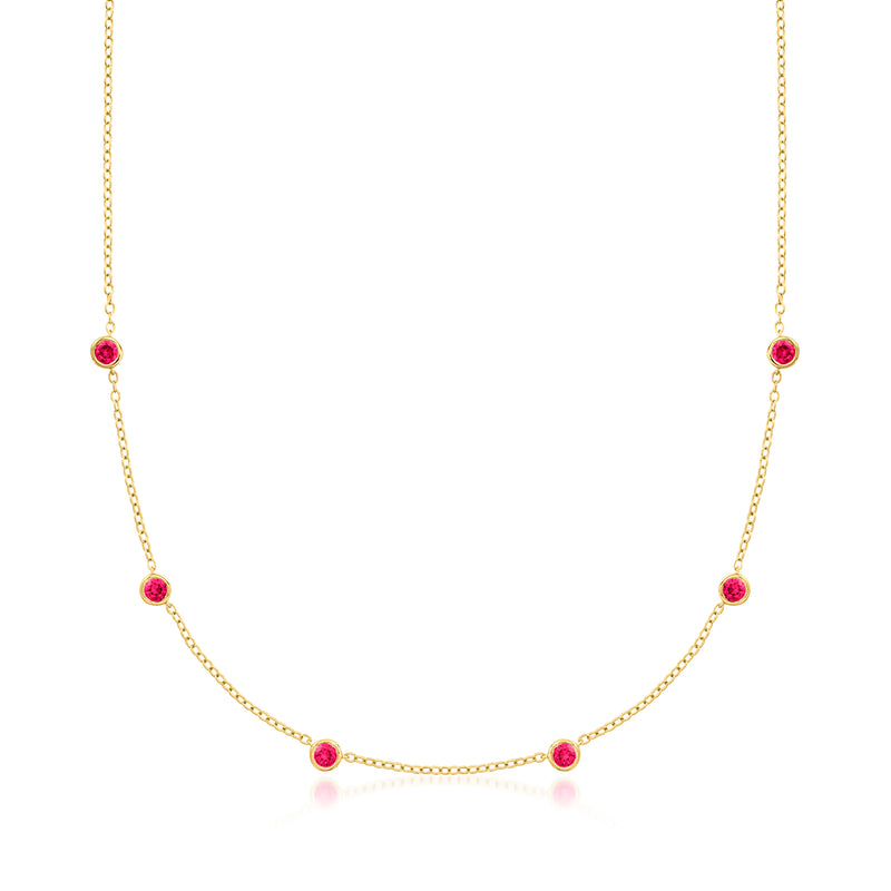 Gold station necklace with bezel-set round ruby beads, delicate chain