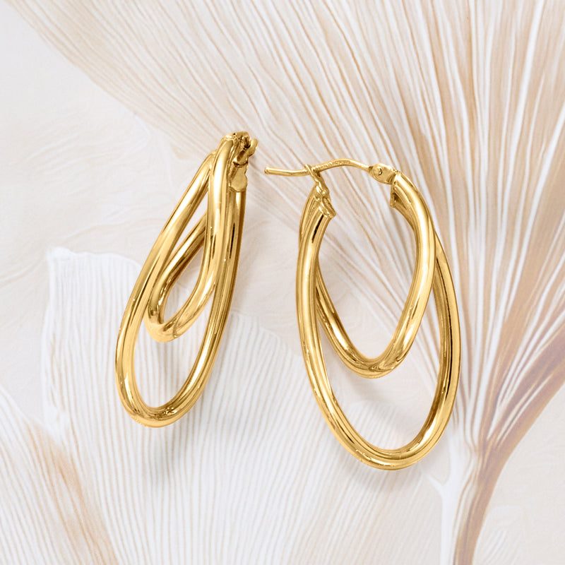 Polished 14kt yellow gold double-hoop earrings with layered oval hoops