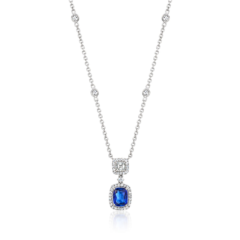18kt white gold station necklace with blue sapphire pendant and diamond accents