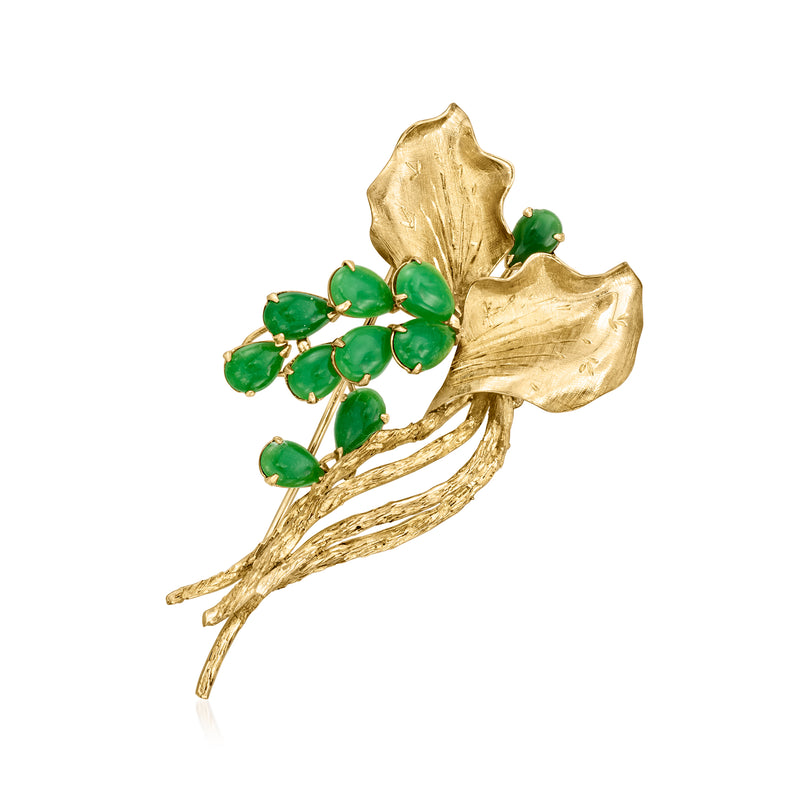 Vintage floral lapel pin with green jade-like beads on 10kt yellow gold setting