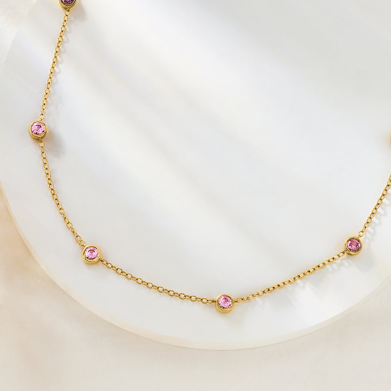 Pink round bezel-set sapphire station links on 18kt gold over sterling chain