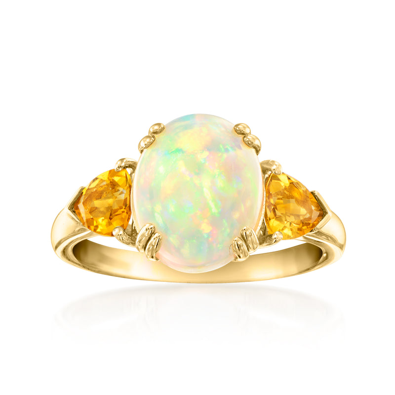 Opal three-stone ring in yellow gold with pear-cut citrine side stones