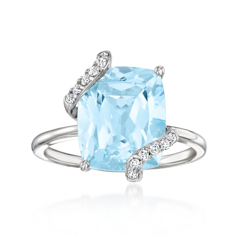 Sky blue topaz engagement ring in 14kt white gold with diamond accents
