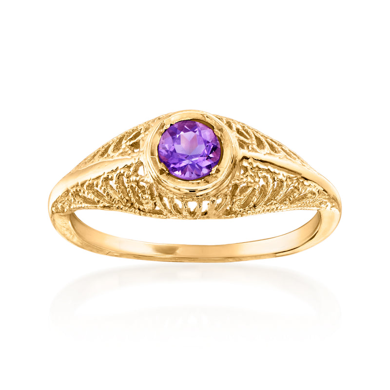 Amethyst ring in 14kt yellow gold with oval purple gemstone, ornate vintage setting