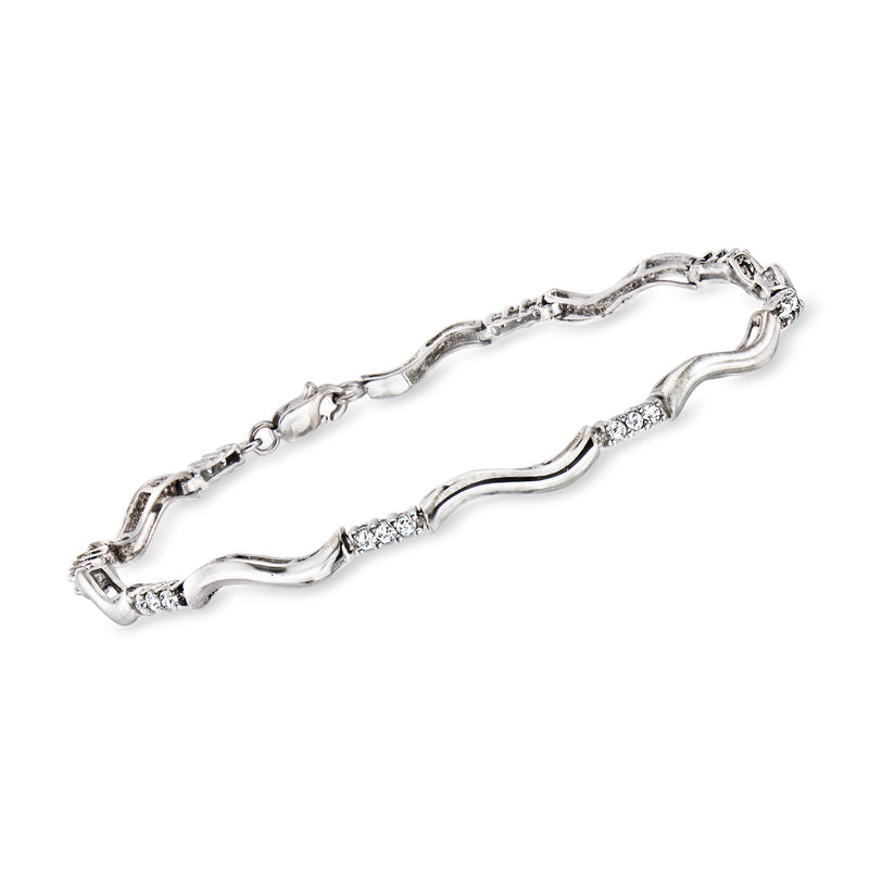 10kt white gold wavy station diamond bracelet with sparkling links