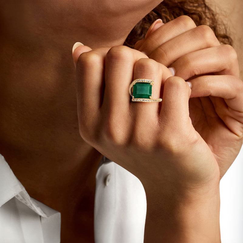 Emerald bypass ring with white topaz accents in gold over sterling