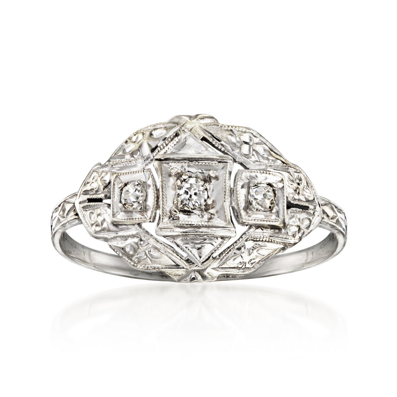 18kt white gold diamond ring with four square-set diamonds