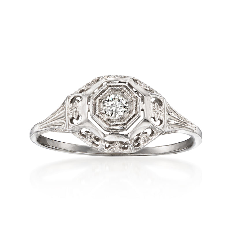 Vintage white gold ring with octagonal center diamond and filigree side details