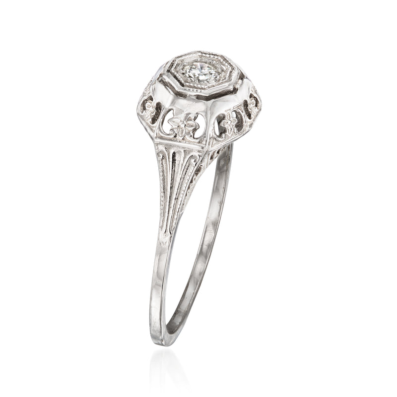 White gold diamond filigree ring with faceted octagonal center and decorative setting