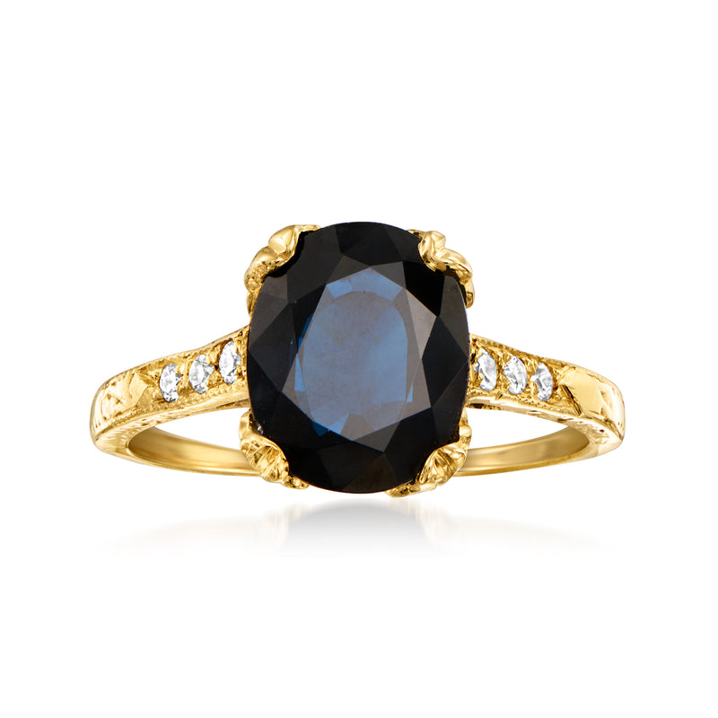 Vintage oval dark sapphire ring in 14kt yellow gold with diamond accents