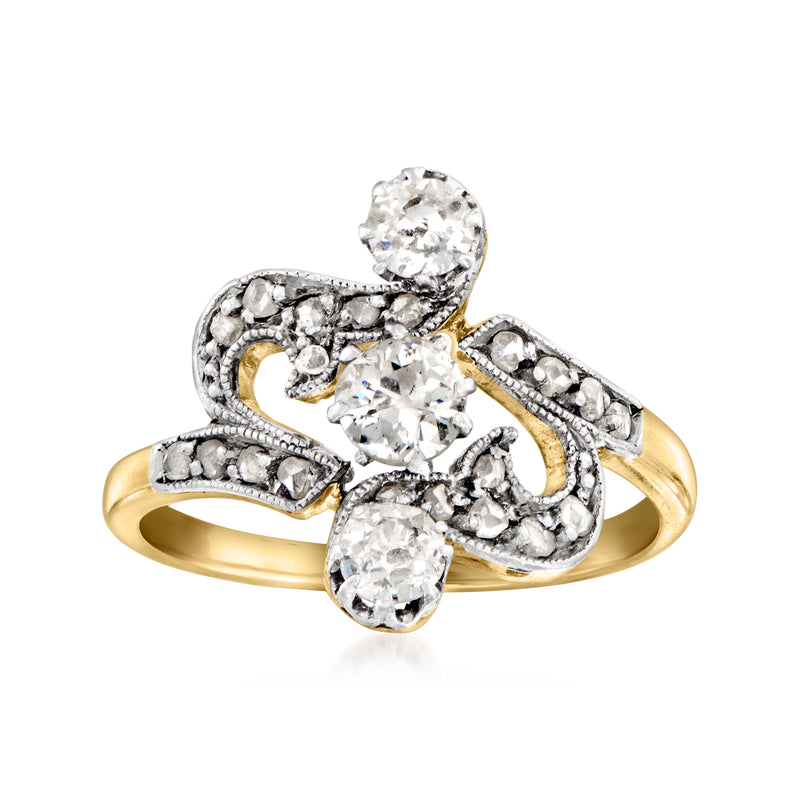 Vintage diamond swirl ring, platinum and 18k yellow gold, three round stones