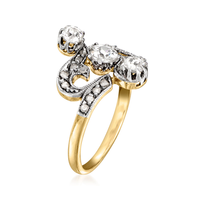 Diamond swirl ring with three round stones in platinum, set over yellow gold band