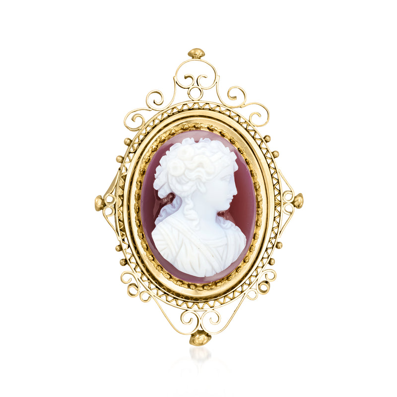 Oval red agate cameo pin in 10kt yellow gold with white profile relief