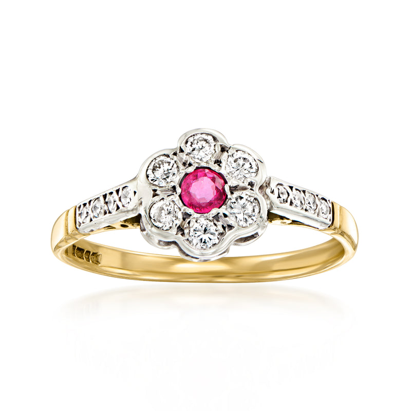 Two-tone 9kt gold flower ring with pink ruby center and diamond halo details