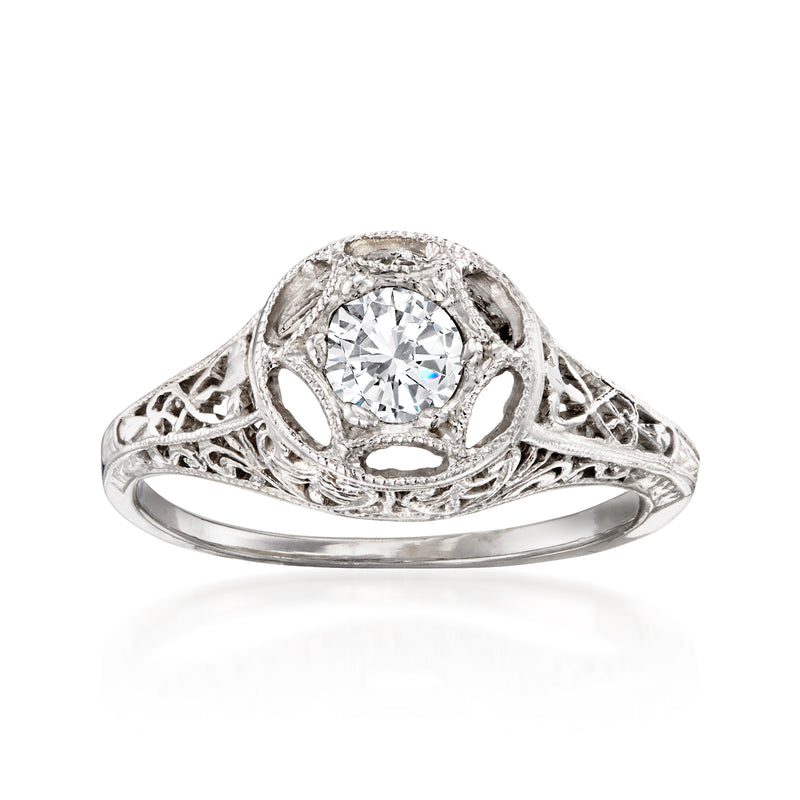 White gold filigree diamond halo ring with round center stone