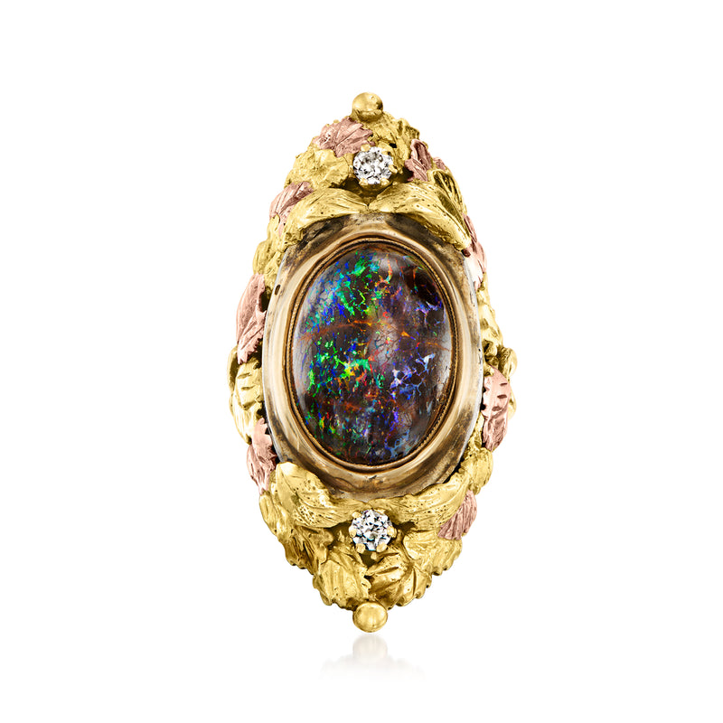 Vintage gold leaf ring with oval black boulder opal center and diamond accents