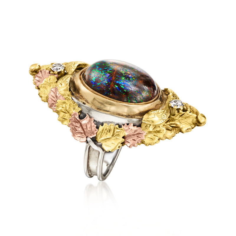 Tri-colored gold leaf ring with oval opal cabochon and small diamond highlights