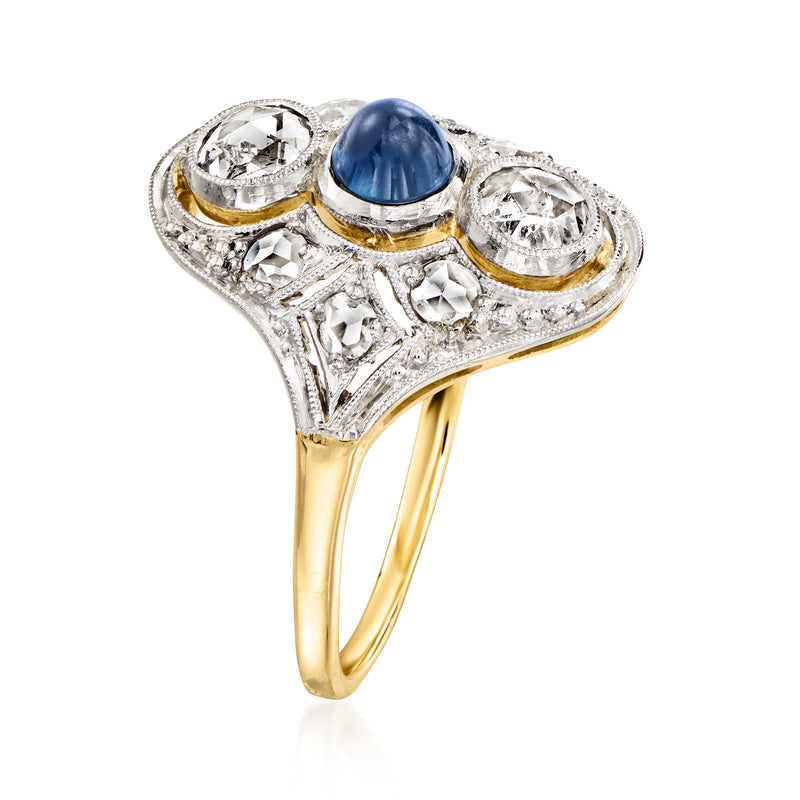 Vintage sapphire and diamond ring side view, blue cabochon with three clear stones