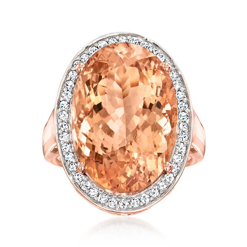 Rose gold oval morganite-style ring with diamond halo and split shank