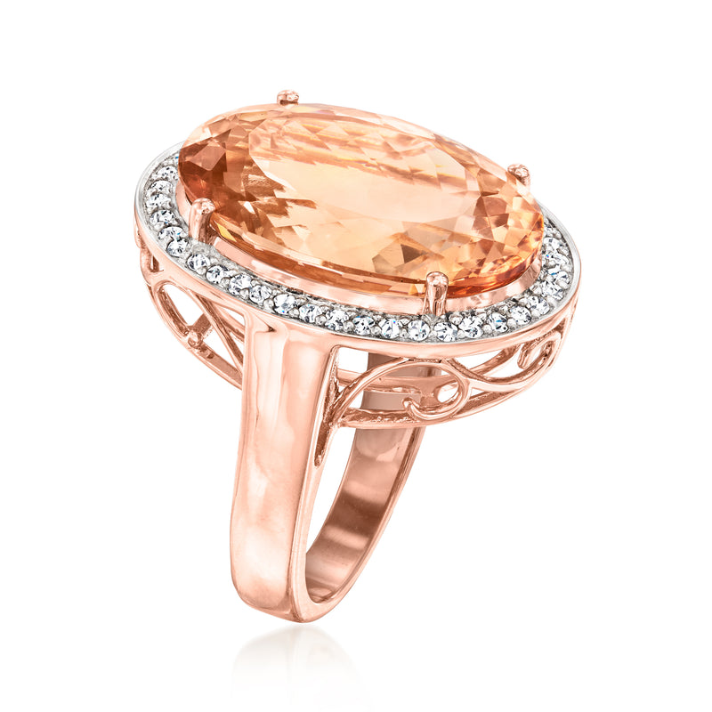 Rose gold ring with large oval peach gemstone and diamond halo, side view