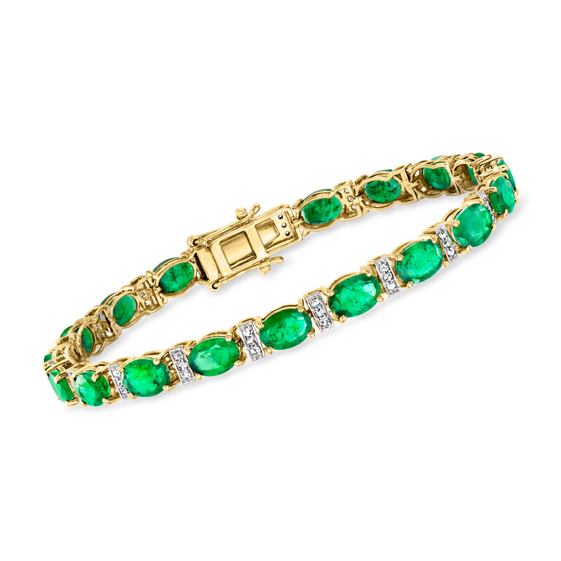 Yellow gold tennis bracelet with emerald green stones and diamond accents, hinged clasp