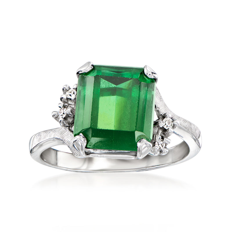 Vintage green tourmaline ring with diamond accents in 14kt white gold, emerald-cut centerpiece
