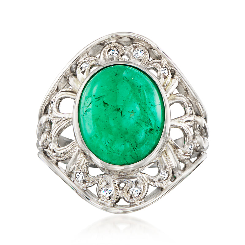 Platinum oval green emerald ring with surrounding diamond accents