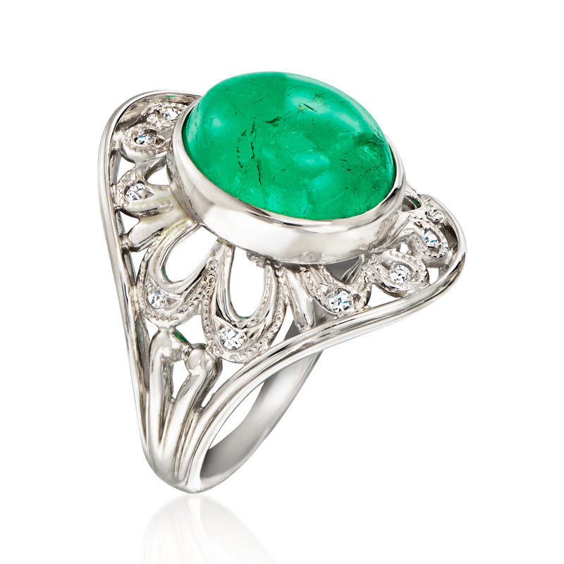 Platinum ring with large oval green emerald center and diamond side details