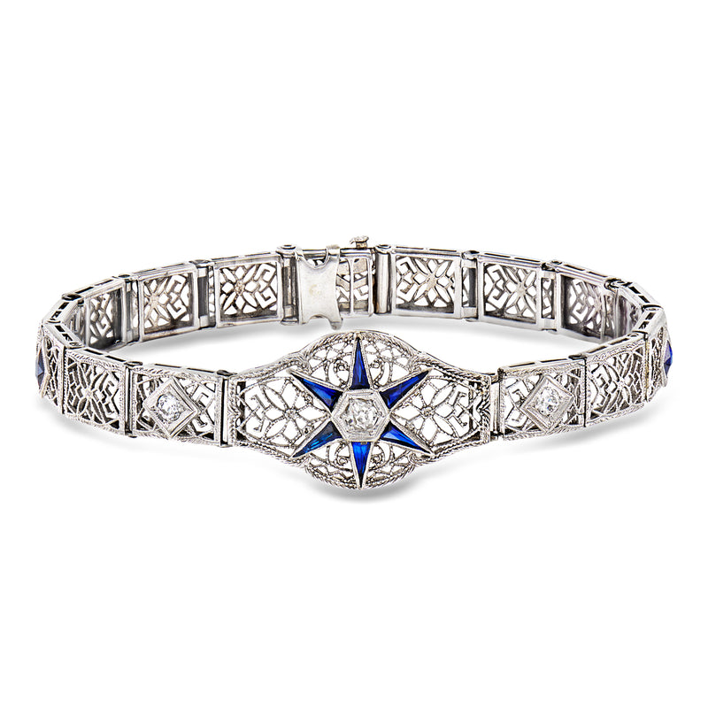 Vintage filigree sapphire diamond bracelet in 18k white gold, blue star center