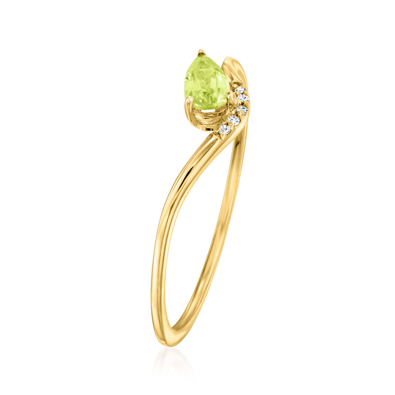 14kt yellow gold ring with pear-cut green peridot, diamonds, curved open setting