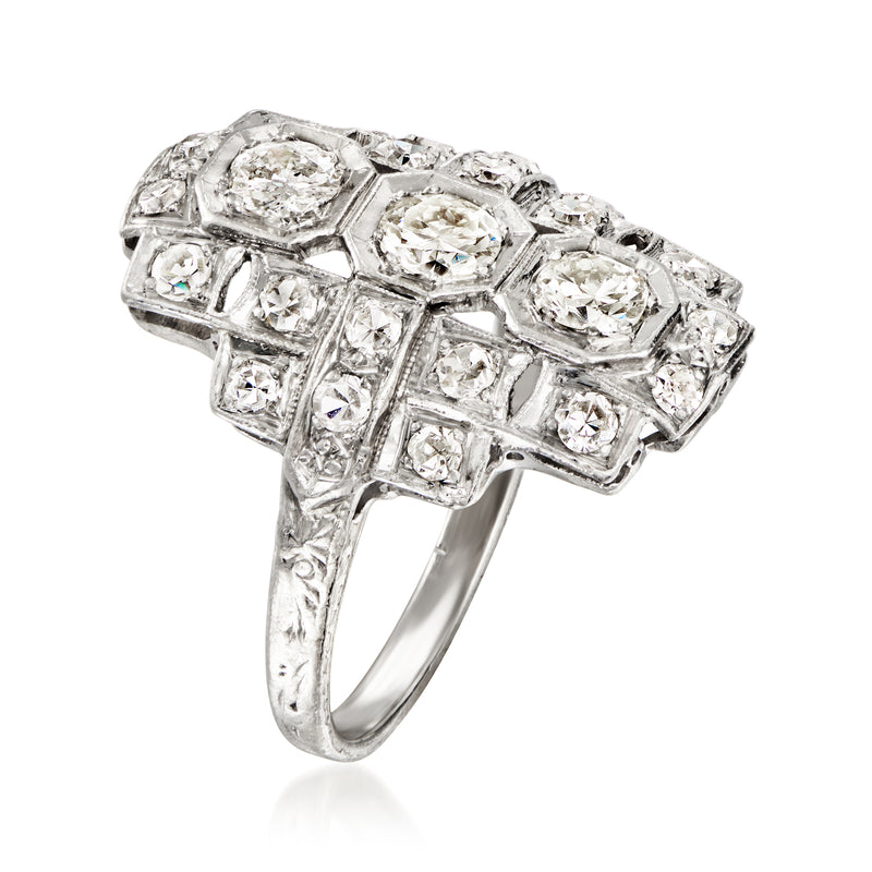Platinum geometric diamond cluster ring viewed from the side with prong-set stones