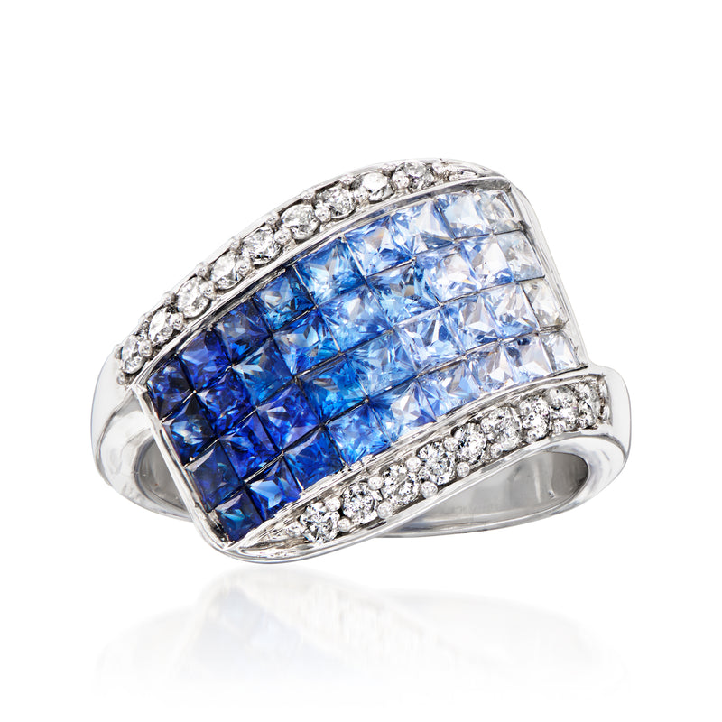 14kt white gold ring with tonal blue sapphire rectangle and diamond halo bands