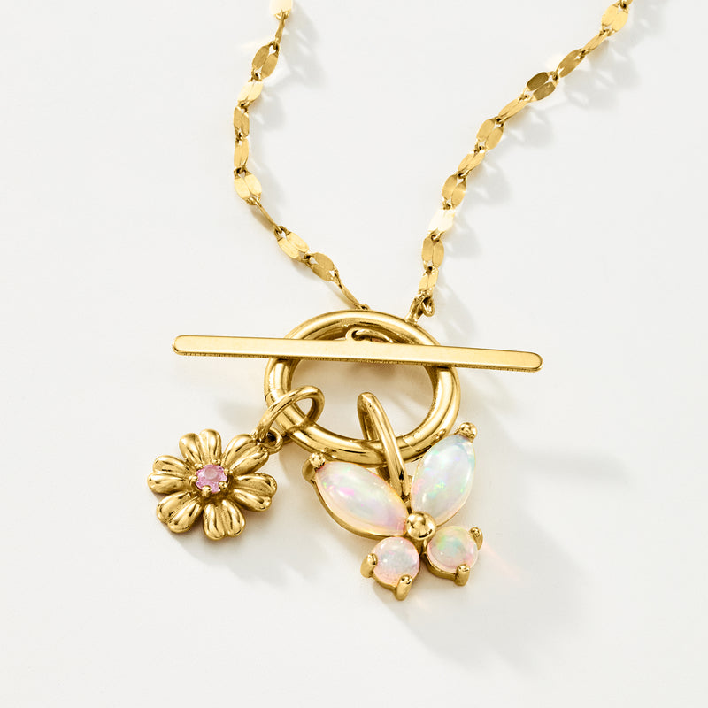 14kt yellow gold butterfly opal charm with dangling flower and chain bar clasp