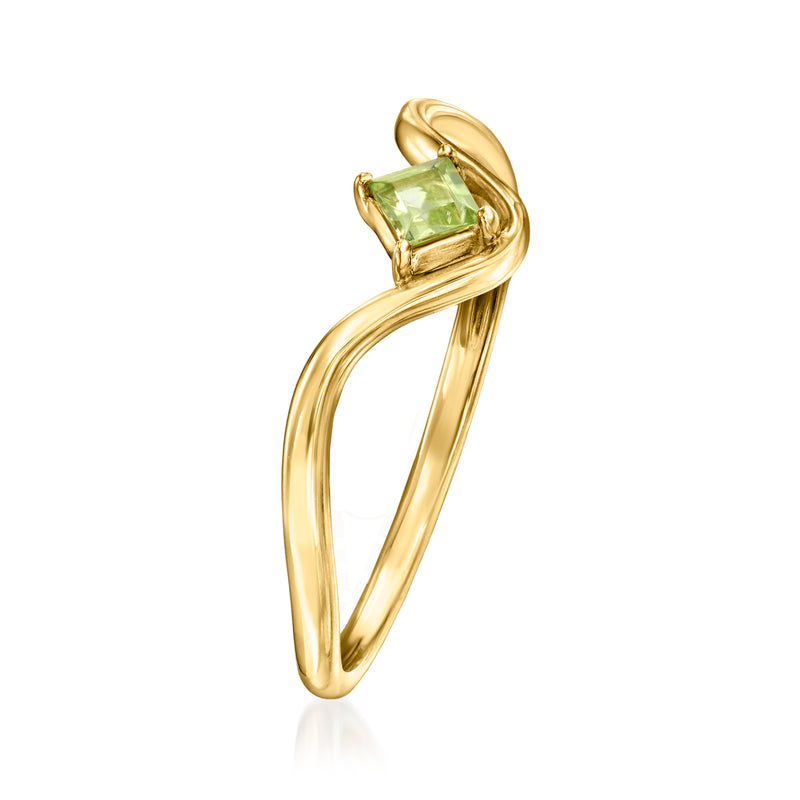 Angle view of 14kt yellow gold curvy ring with square green peridot stone.