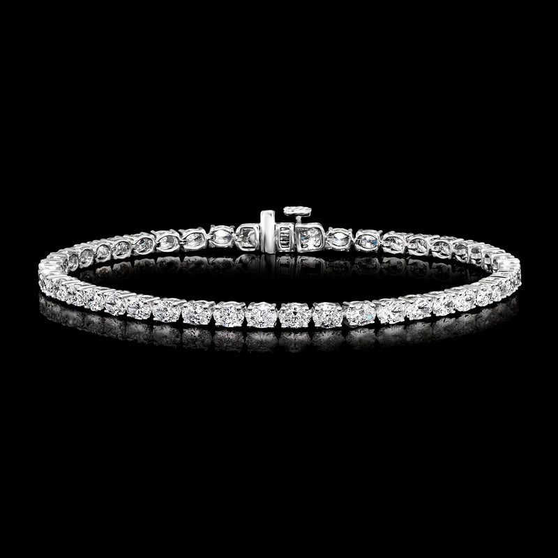 Sparkling 14kt white gold tennis bracelet with evenly set round diamonds