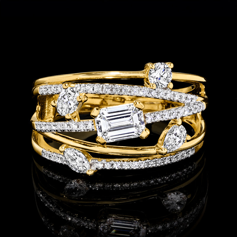 Gold diamond highway ring close-up with baguette center and sparkling round accents