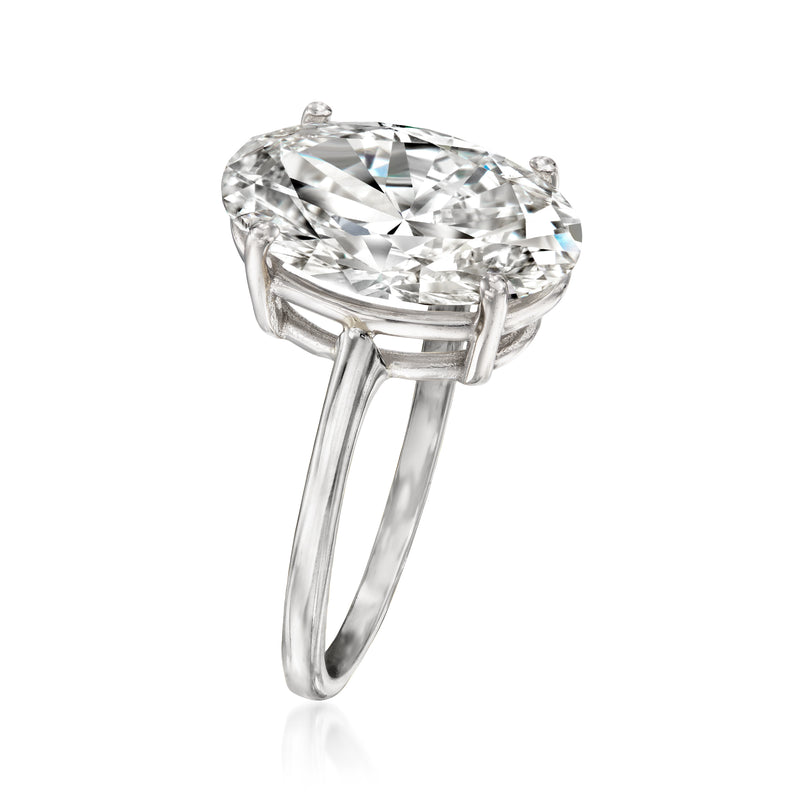 Oval diamond solitaire ring in 14kt white gold, side profile with prongs