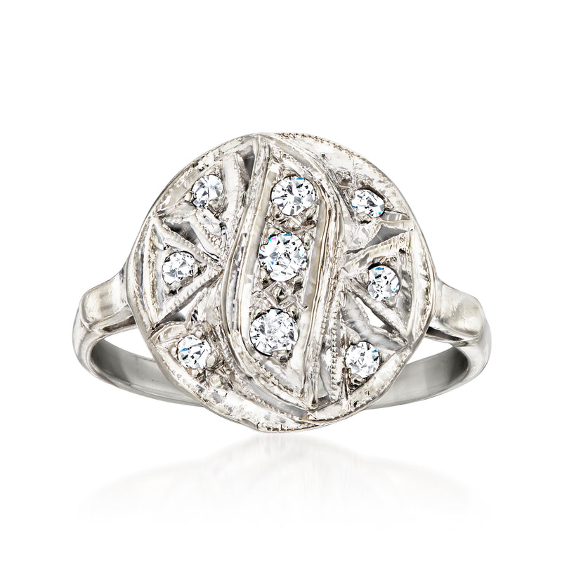 Vintage white gold diamond disc ring with oval face and raised ribbed setting