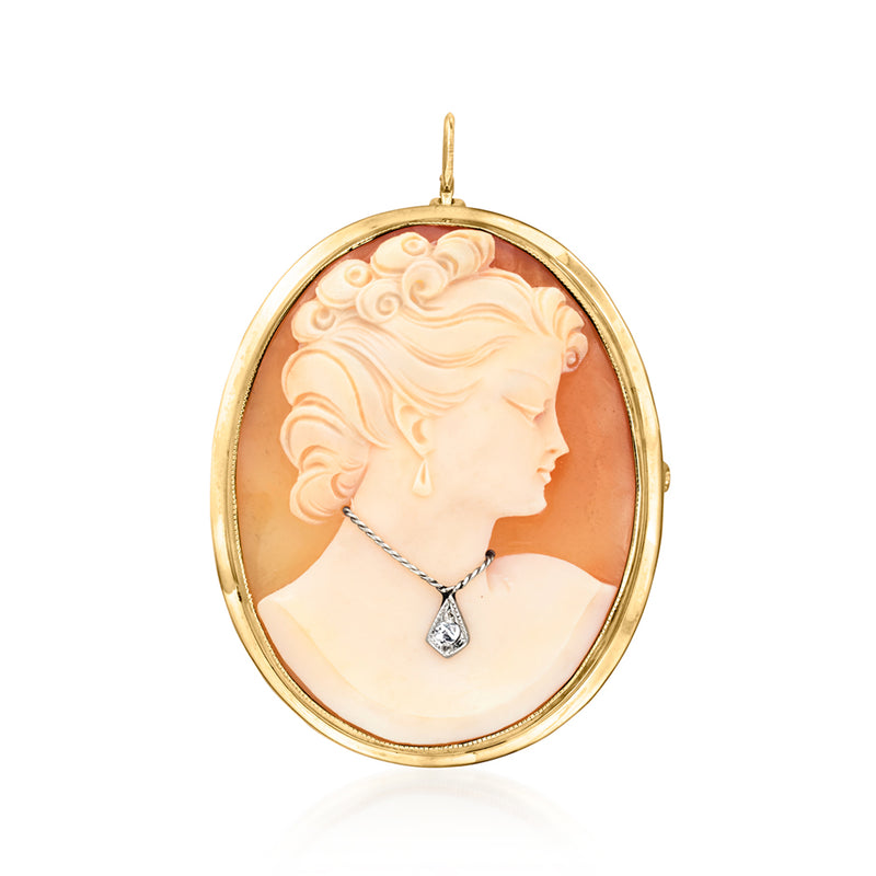 Vintage shell cameo pendant in 10kt yellow gold with single diamond drop