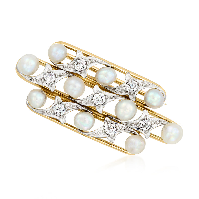 Vintage bar pin with white cultured pearls and diamond-like accents on gold-toned metal