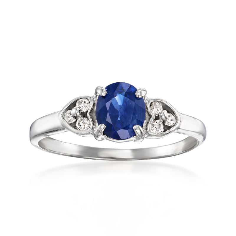 Oval blue sapphire ring in white gold with diamond side accents