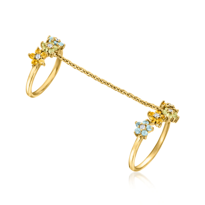 Gold-tone gemstone flower double ring, side view with blue and yellow clusters and chain