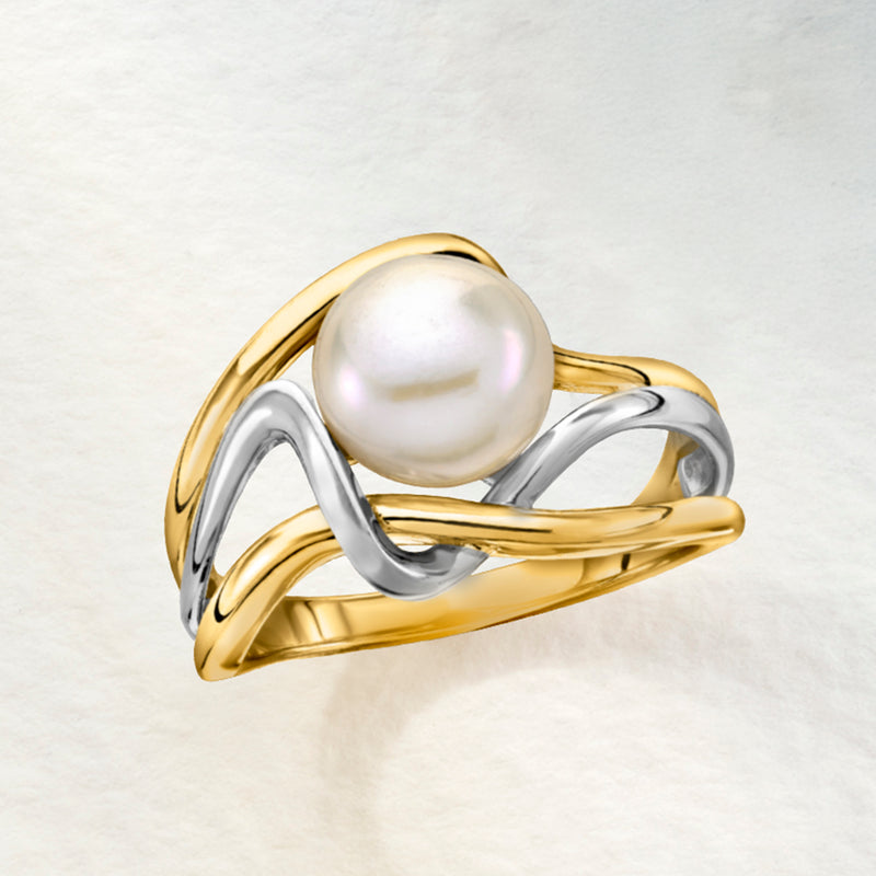 Gold and silver wavy ring with white cultured pearl and curved crossover setting