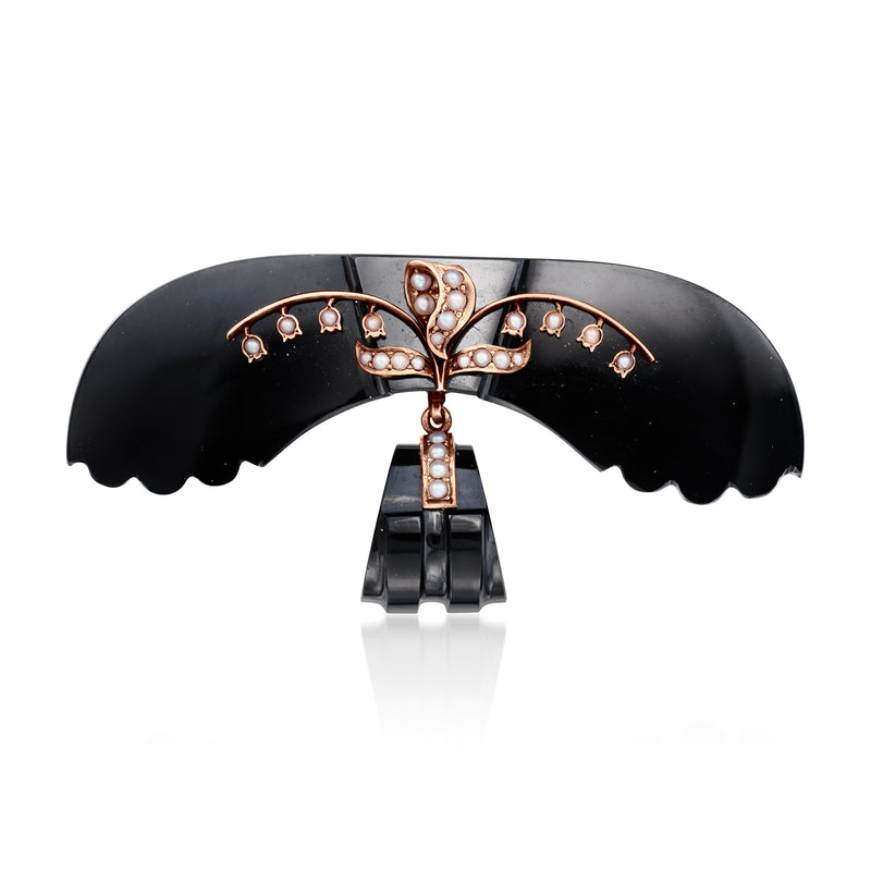 Vintage onyx pin with seed pearls and rose-gold frame, arched floral design