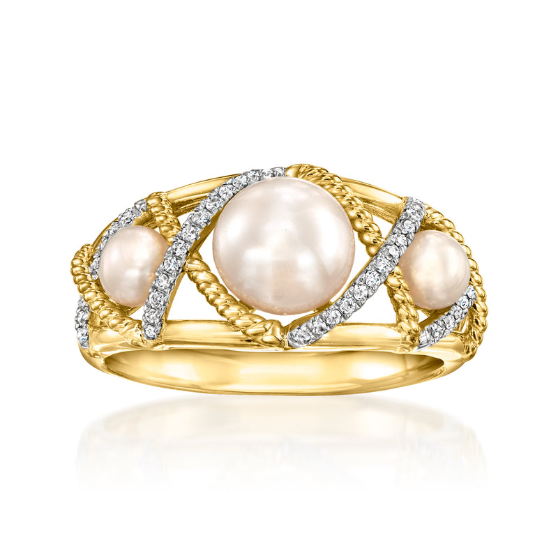 Gold crisscross ring with three cultured pearls and diamond accents, shiny band