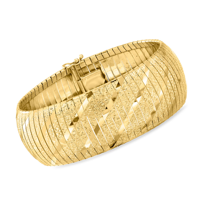 Wide 14kt yellow gold omega bracelet with textured geometric link bangle and clasp