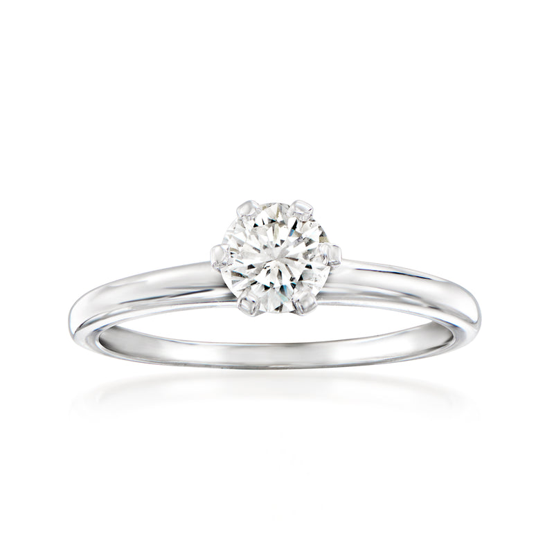 Vintage solitaire diamond ring in 18kt white gold with round center stone