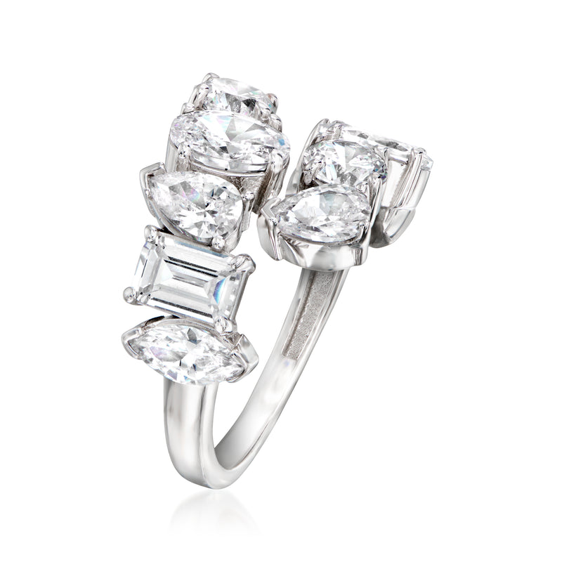 Sterling silver bypass ring with large square CZ center and oval plus baguette sides.
